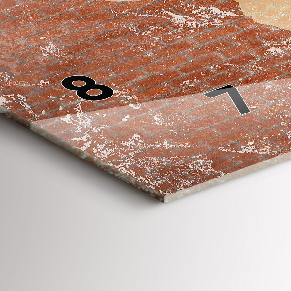 Horizontale Uhr Weltkarte auf einem Ziegelstein