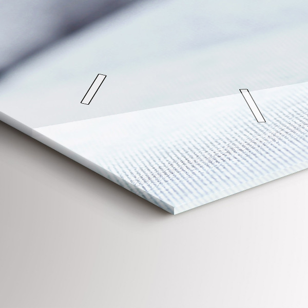 Horizontale Uhr Katze auf einem Sofa