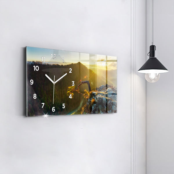 Horizontale Uhr Sonnenuntergang über den Bergen