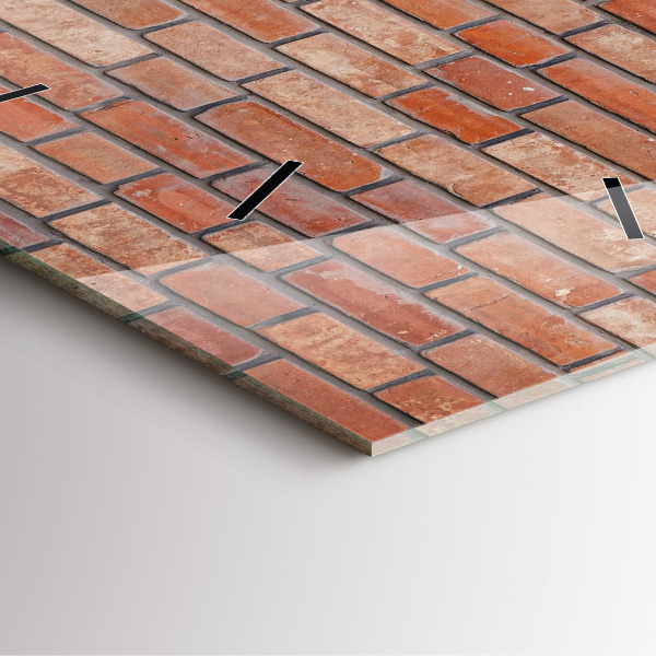 Wanduhr modern quadratisch Backsteinmauer