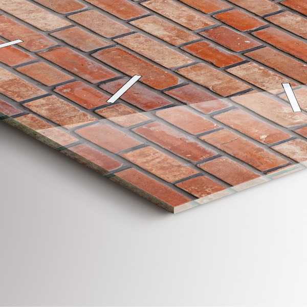 Wanduhr modern quadratisch Backsteinmauer