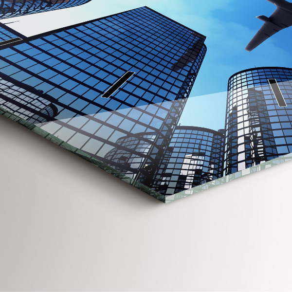 Wanduhr quadratisch mit motiv Flugzeug über Gebäuden