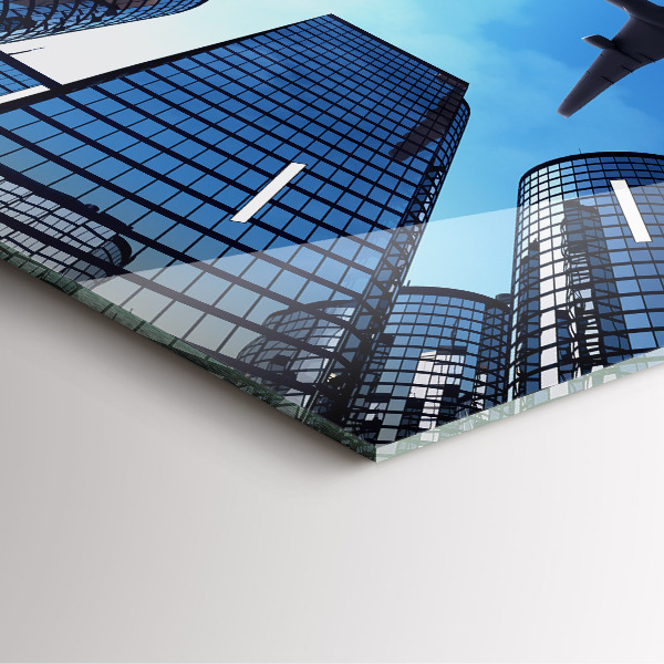 Wanduhr quadratisch mit motiv Flugzeug über Gebäuden