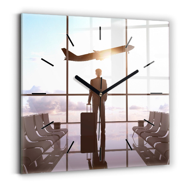 Wanduhr quadratisch Mann auf dem Flughafen
