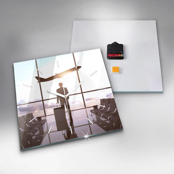 Wanduhr quadratisch Mann auf dem Flughafen