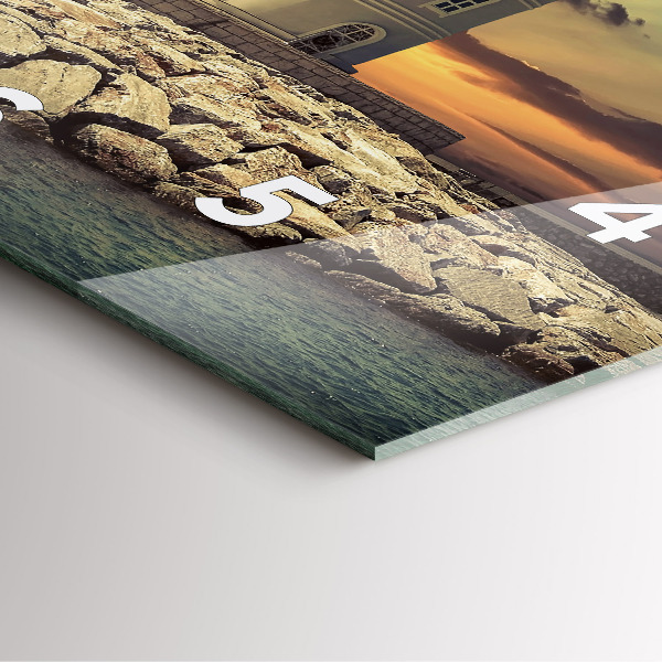 Wanduhr quadratisch Leuchtturm am Meer