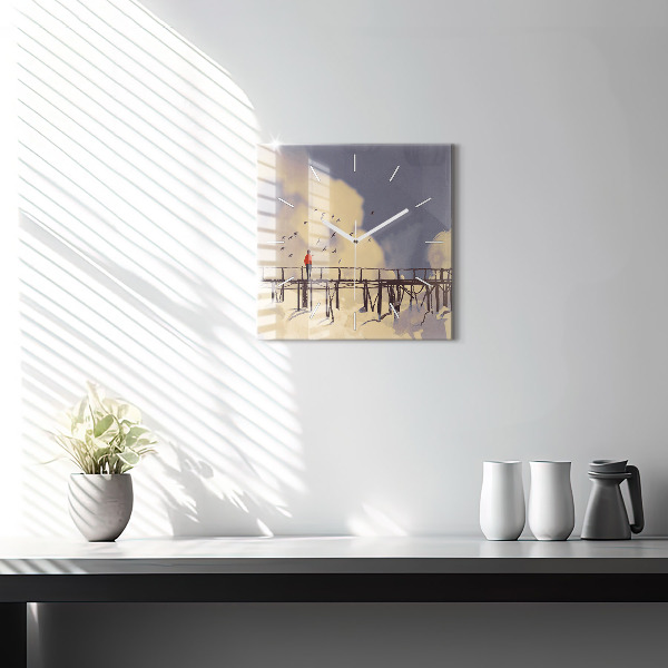 Wanduhr quadratisch Mann auf einer alten Brücke