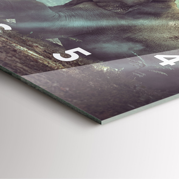 Wanduhr modern quadratisch Junge liest ein Buch