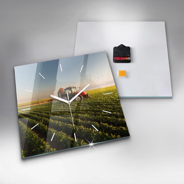 Wanduhr quadratisch mit motiv Traktor sprüht ein Feld