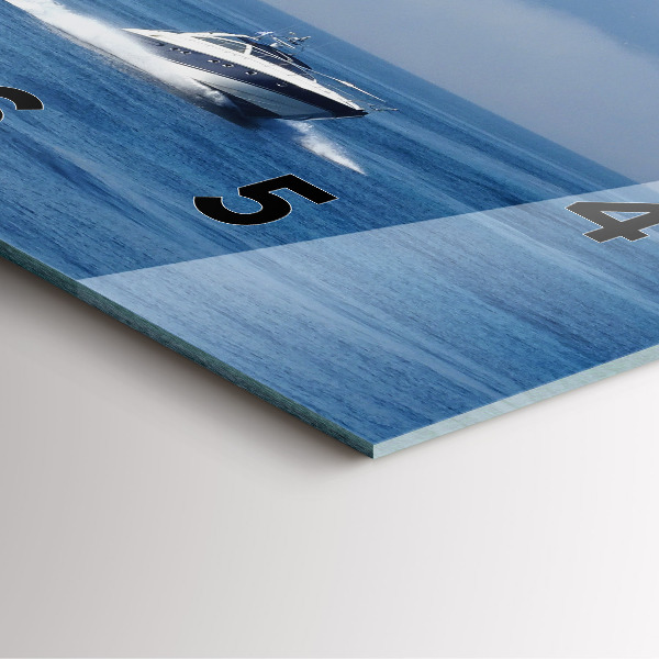 Wanduhr quadratisch Schwimmendes Boot auf dem Meer