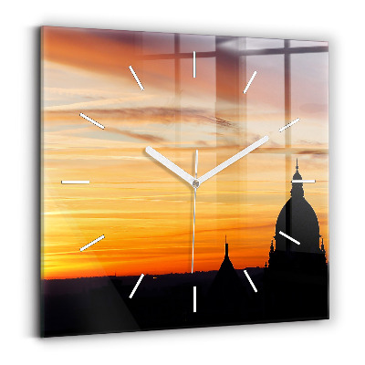Wanduhr modern quadratisch Gebäude und Sonnenuntergang