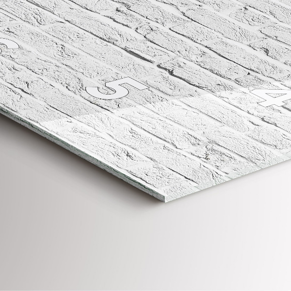 Wanduhr quadratisch Backsteinmauer