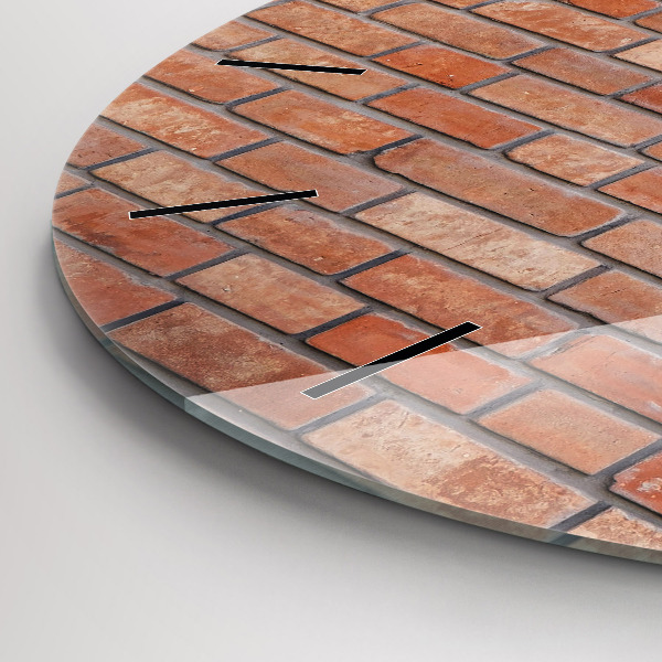 Wanduhr rund Backsteinmauer