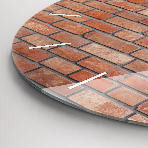 Wanduhr rund Backsteinmauer