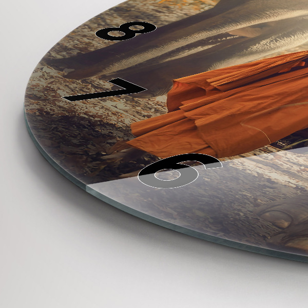 Wanduhr rund mit motiv Mönch führt Elefanten
