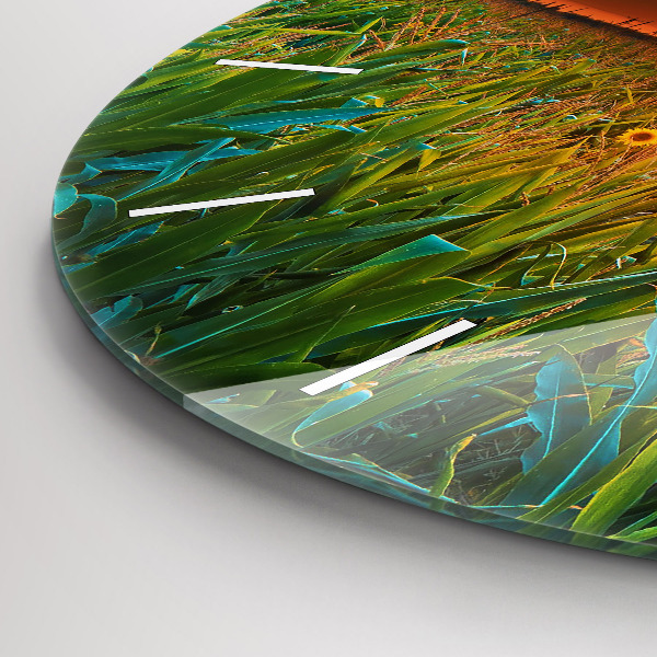 Wanduhr rund Sonnenblumen auf einer Wiese