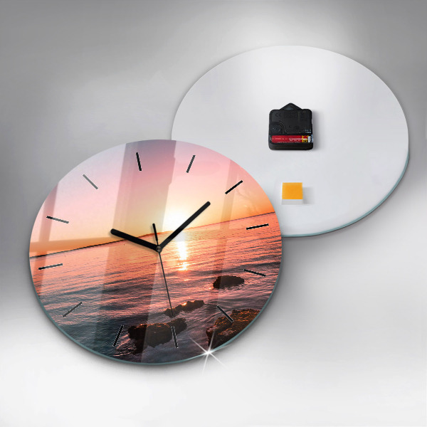 Wanduhr glas rund Felsen bei Sonnenuntergang