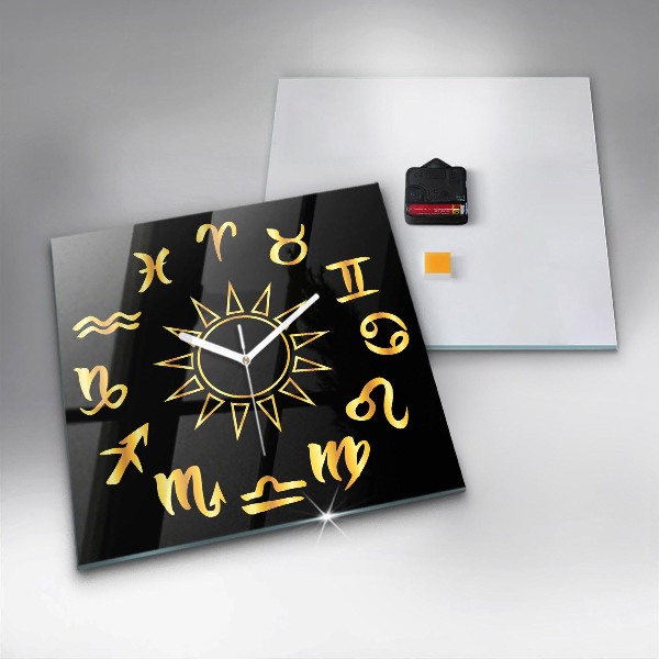 Wanduhr quadratisch mit motiv Goldene Sternzeichen auf schwarzem Hintergrund.